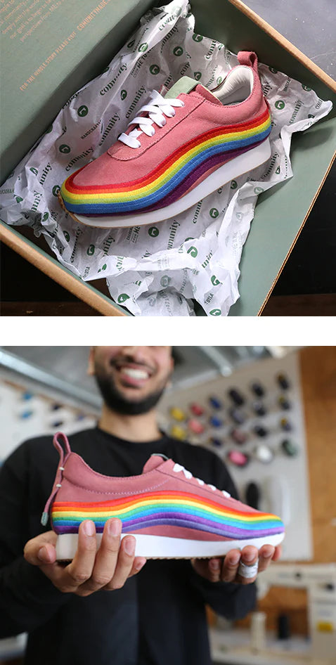rainbow-traction shoes held and in box