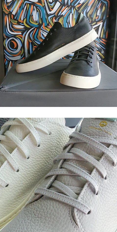 black shoes on top leather sneakers with white leather sneakers on bottom