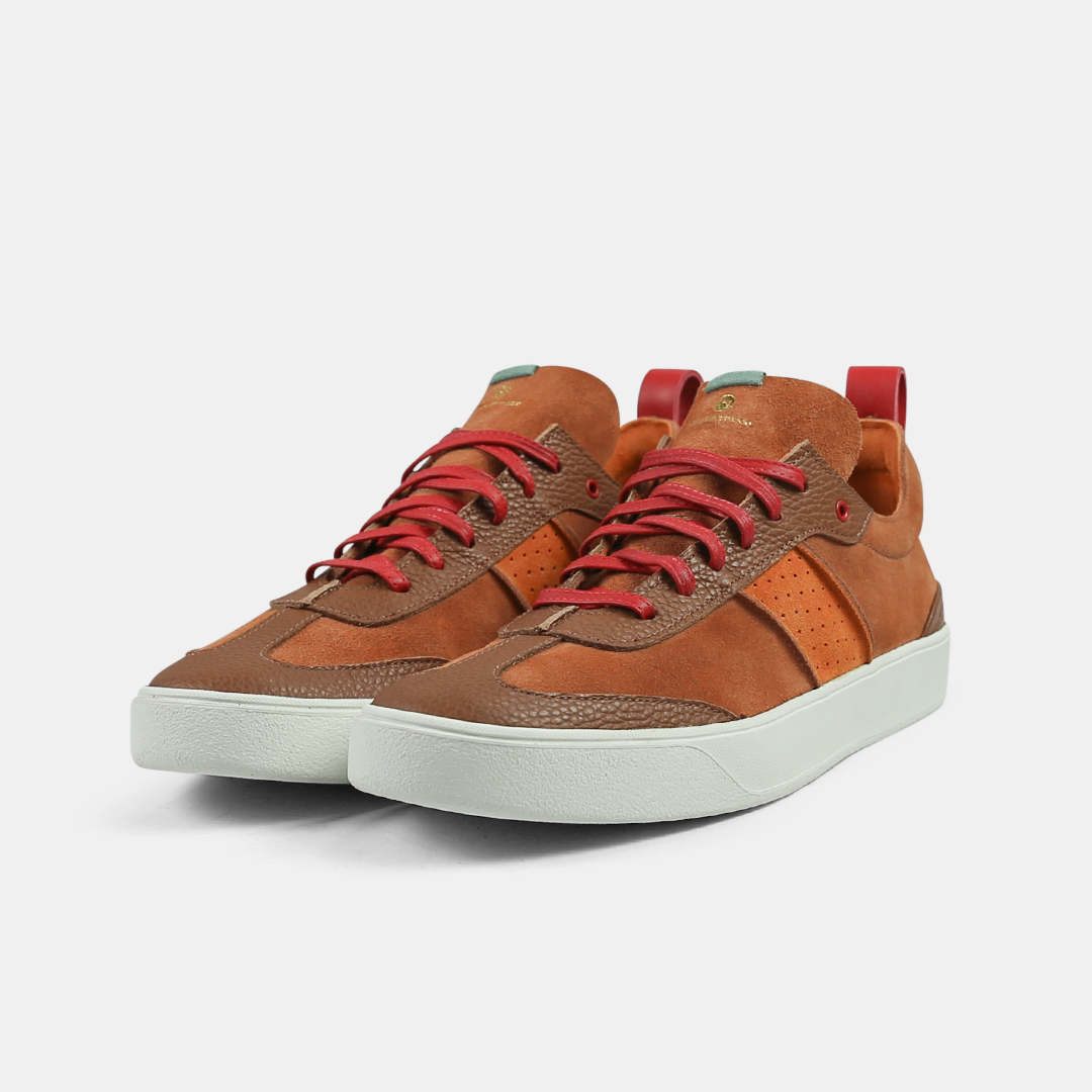 A brown men's sneaker with a lace-up closure, made from Italian leather, with a rubber cupsole quarter view