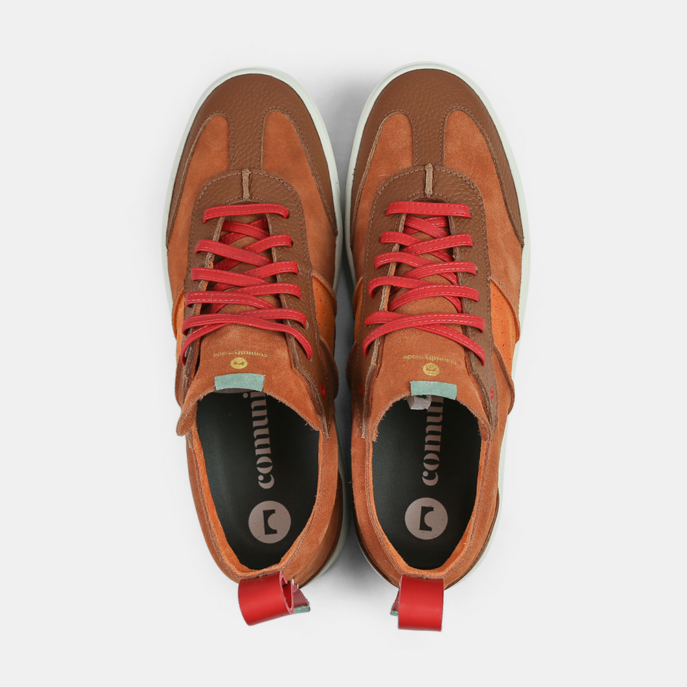 
                      
                        A brown men's sneaker with a lace-up closure, made from Italian leather, with a rubber cupsole top view
                      
                    