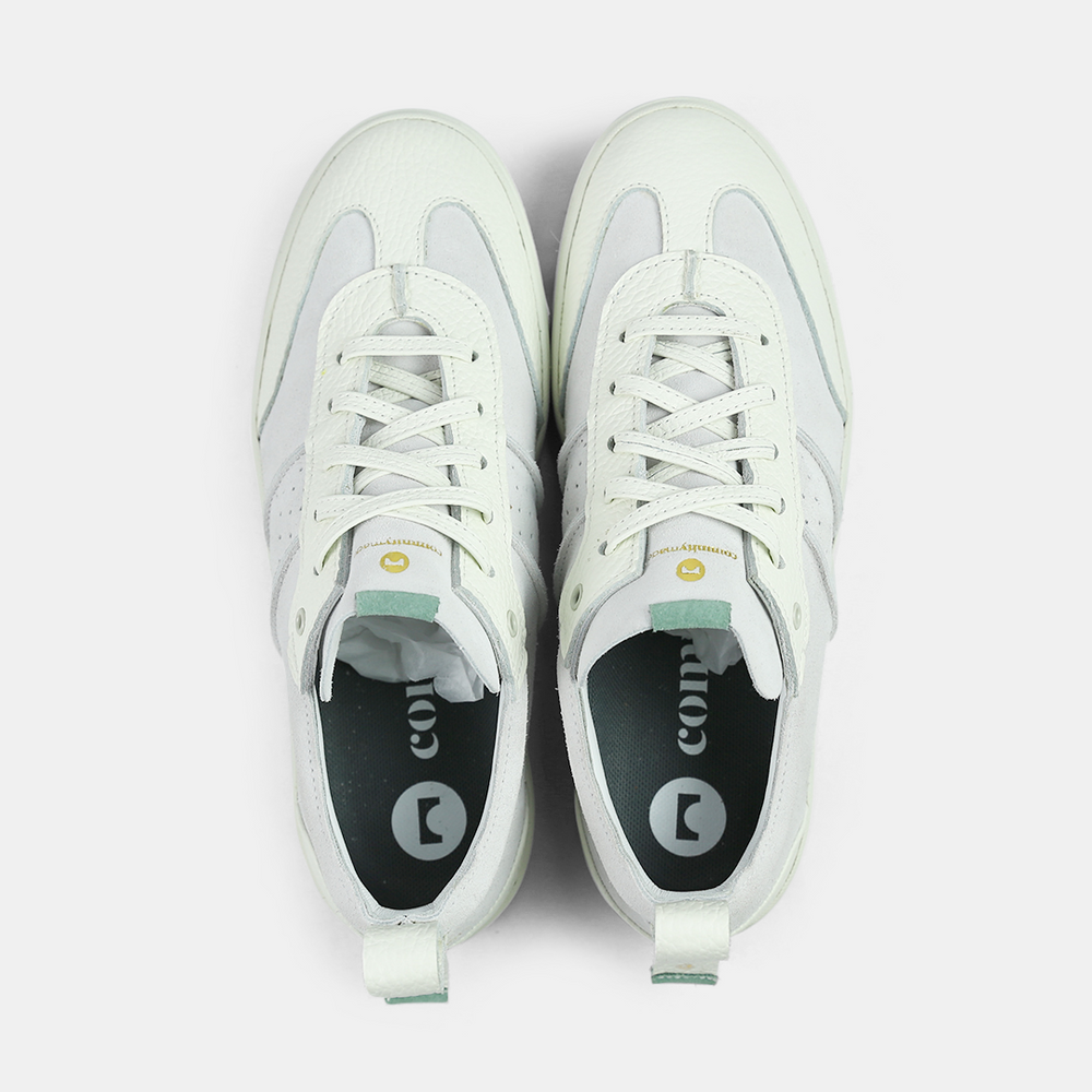 
                      
                        A white men's sneaker with a lace-up closure, made from Italian leather, with a rubber cupsole top view
                      
                    