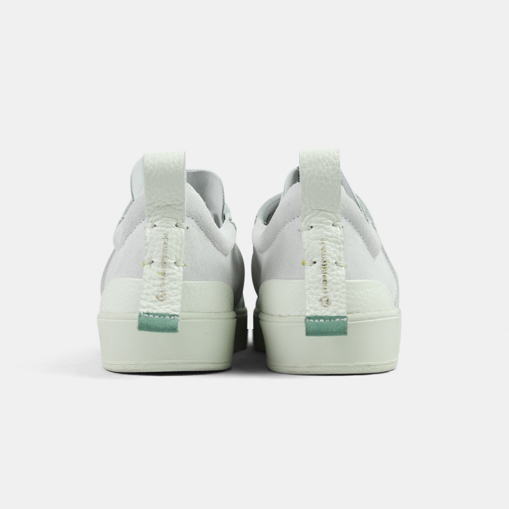 
                      
                        A white men's sneaker with a lace-up closure, made from Italian leather, with a rubber cupsole back view
                      
                    