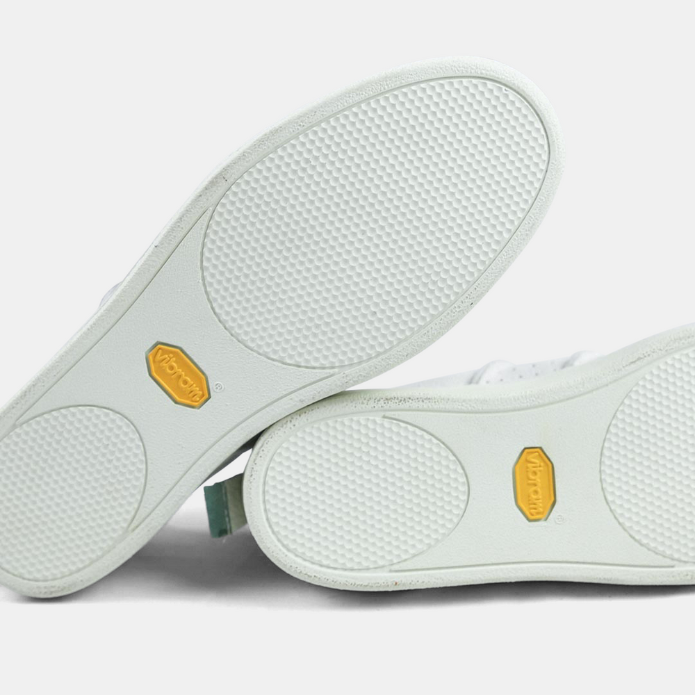 
                      
                        White Rubber outsole made by Vibram
                      
                    