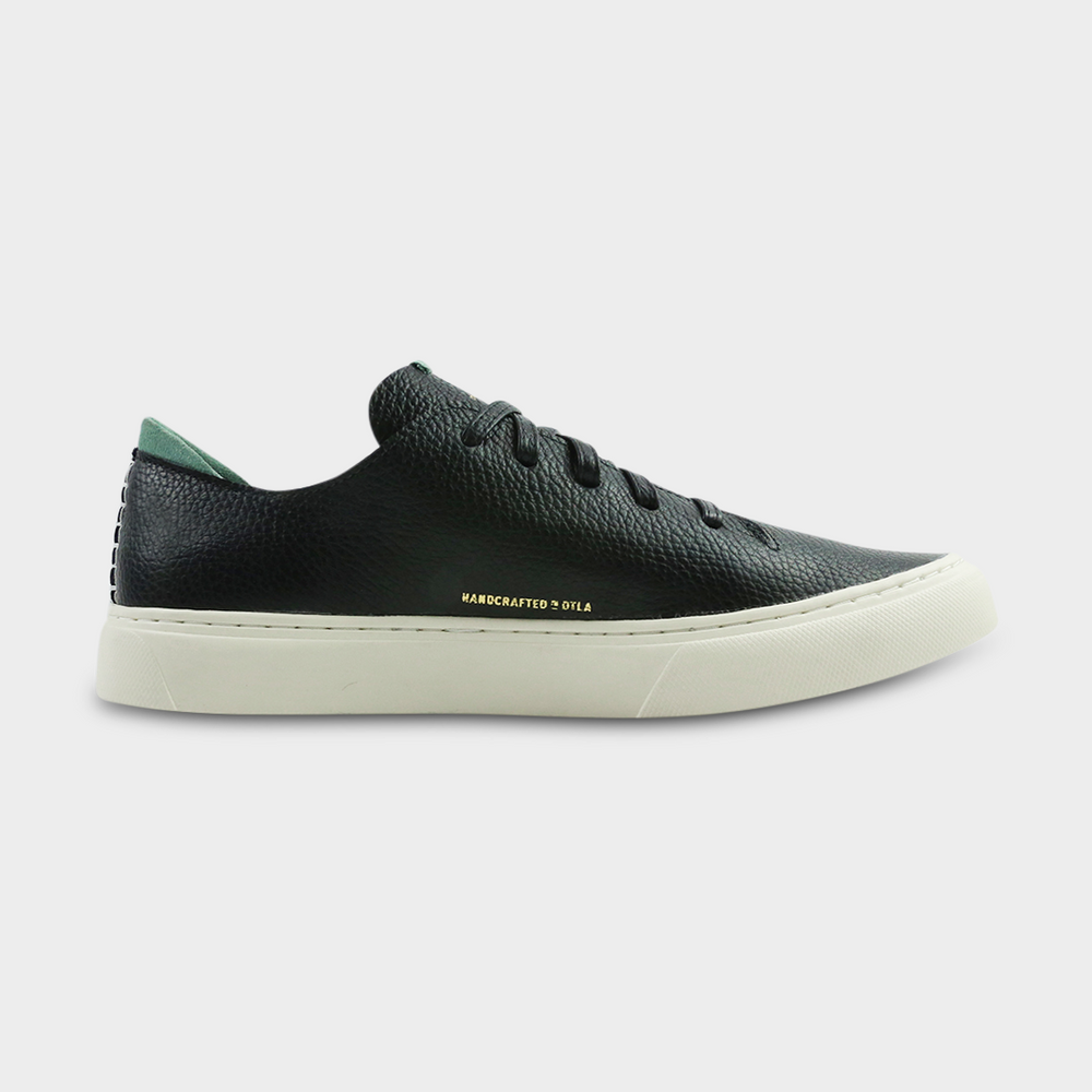 
                      
                        A black men's sneaker with a lace-up closure made with Italian full grain leather, featuring a rubber cupsole medial view
                      
                    