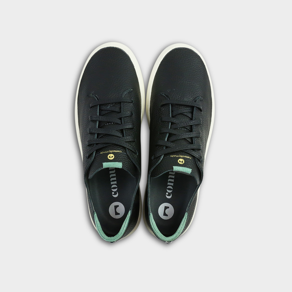 
                      
                        A black men's sneaker with a lace-up closure made with Italian full grain leather, featuring a rubber cupsole top view
                      
                    