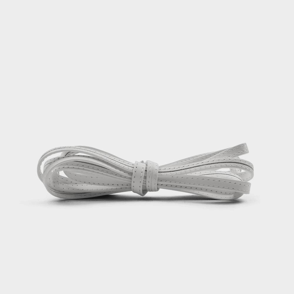 
                      
                        A grey leather lace tied in a knot.
                      
                    