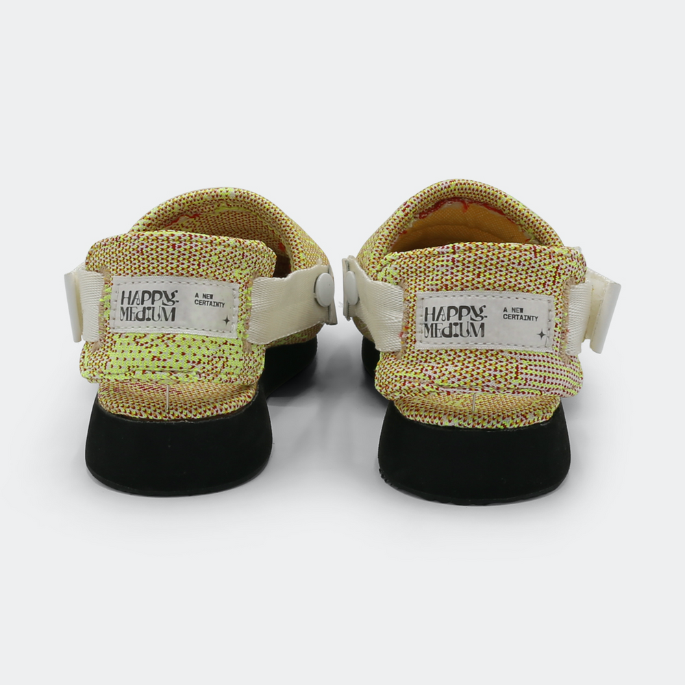 
                      
                        Mateo Slippers with a happy medium branding, featuring a herringbone pattern on the outsole and an adjustable strap back view
                      
                    