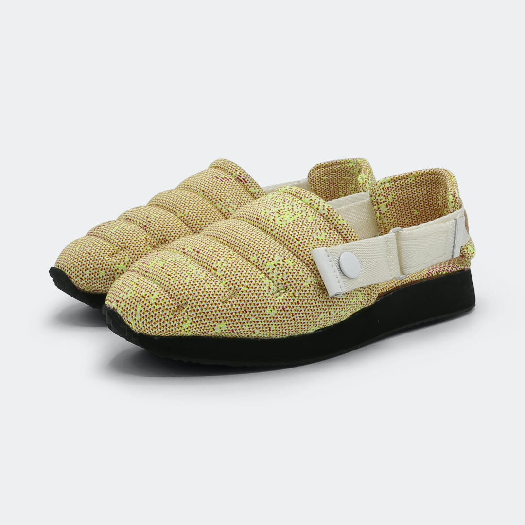 Slipper with a yellow and pink knit upper, an adjustable white strap, and a black rubber outsole quarter view