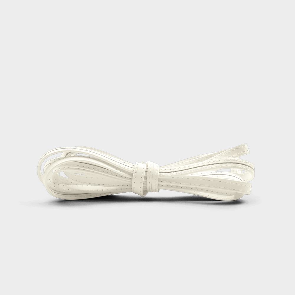 
                      
                        A white leather laces tied in a knot.
                      
                    