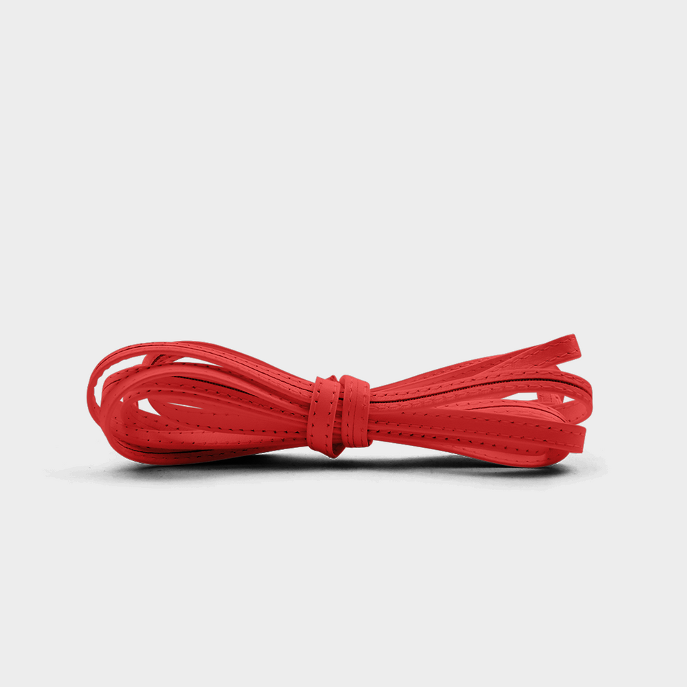
                      
                        A red leather lace tied in a knot
                      
                    