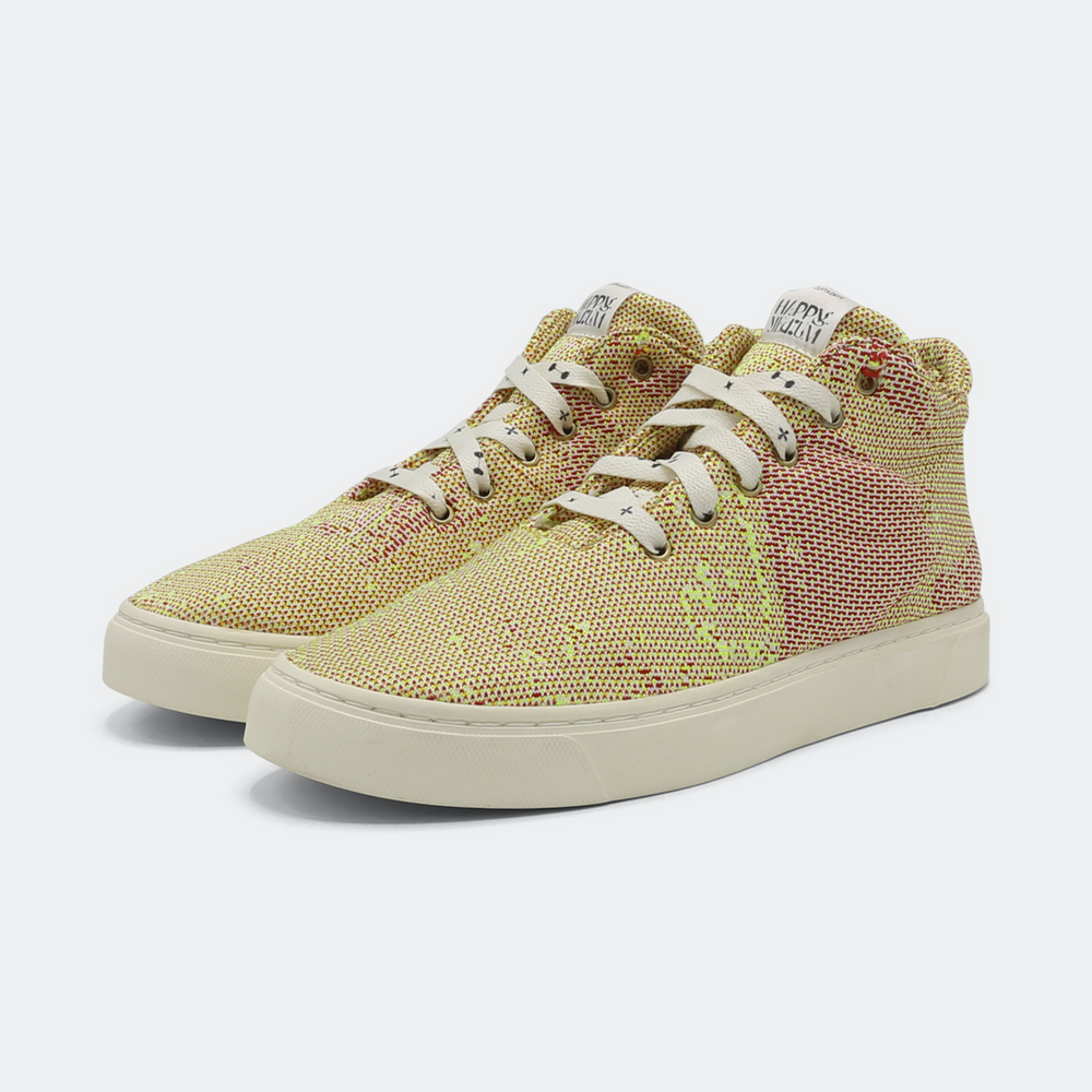 Mid-top sneakers in yellow and pink checkered pattern design quarter view