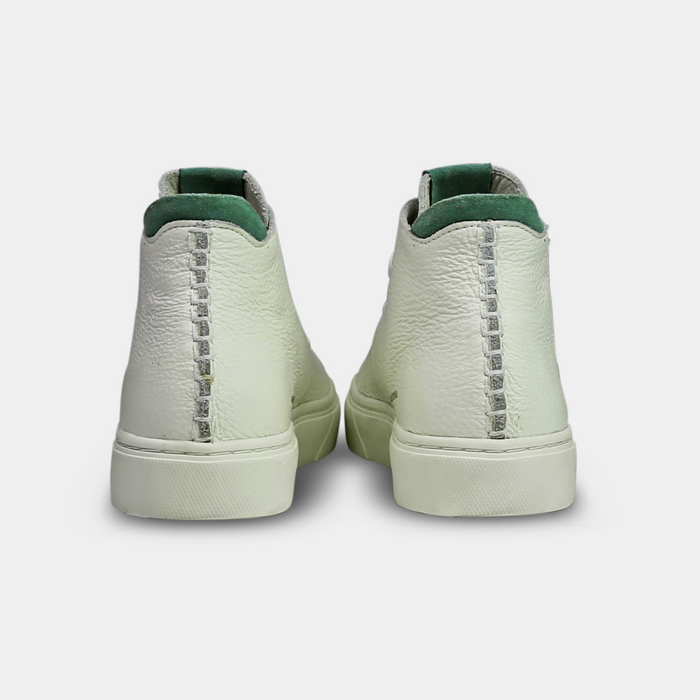 
                      
                        A white, mid-top sneaker with a leather upper, lace-up closure, and a white sole back view
                      
                    